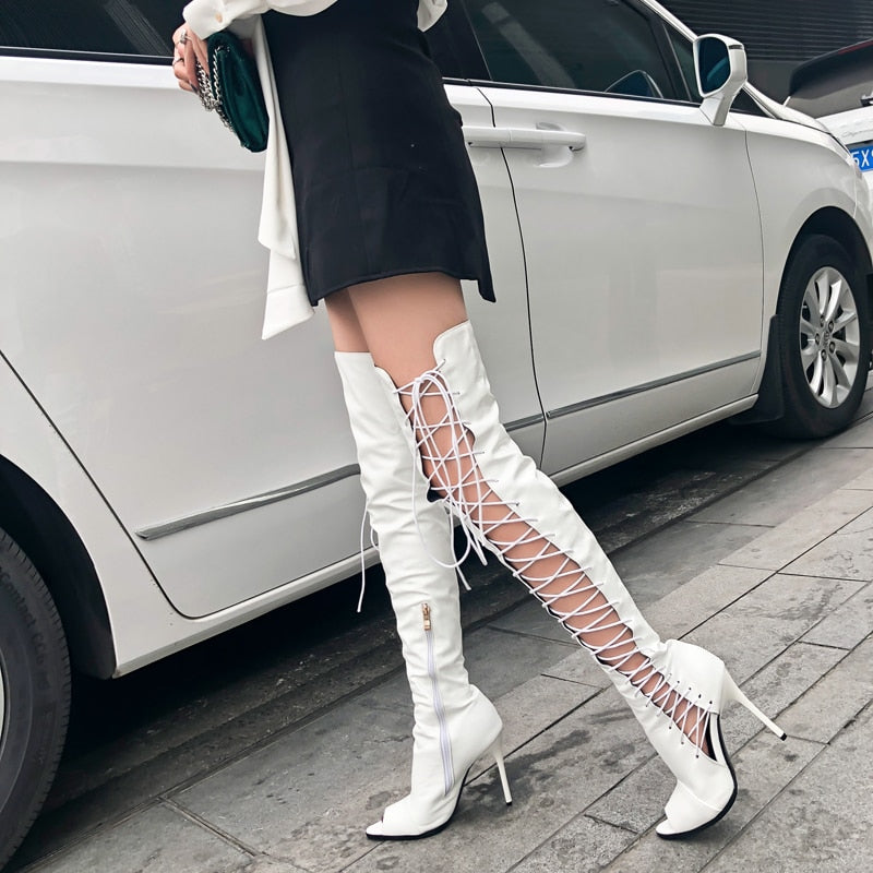 Lace up thigh high heel boot